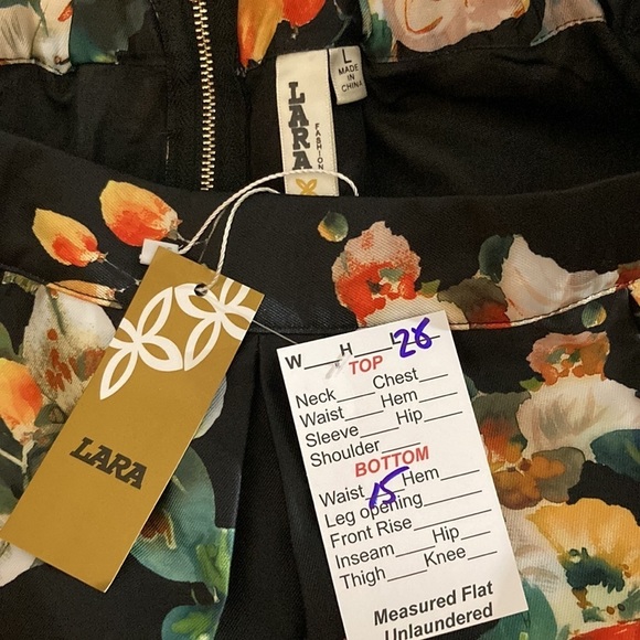 Size L Lara full black skirt with flowers. 30” waist. More like a medium. 125‎ - Picture 4 of 4